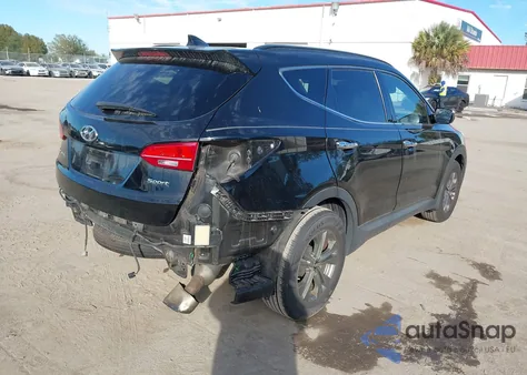 2014 Hyundai Santa Fe Sport 2.4L z USA, uszkodzony, nr VIN 5XYZUDLB7EG209088